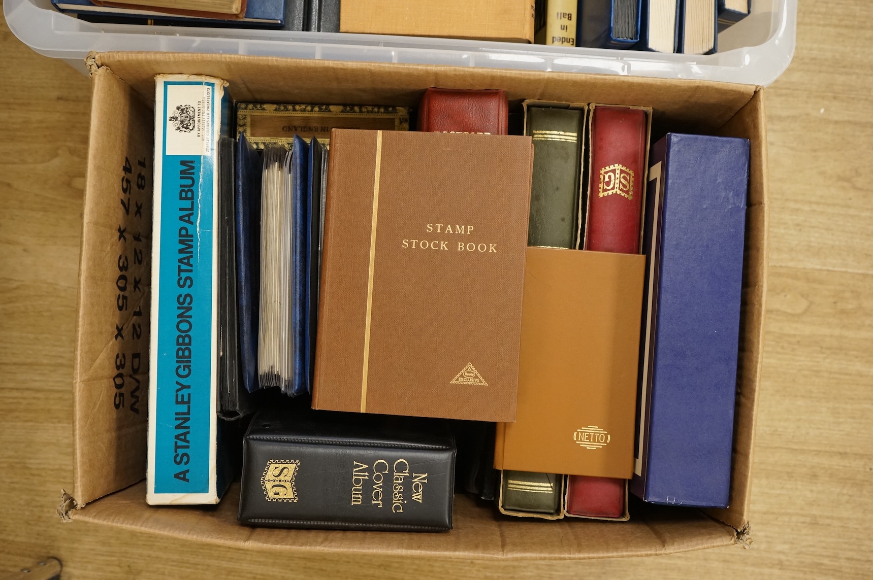A collection of various stamps, mostly in albums